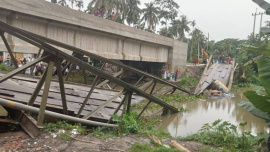 The bridge, located in front of Debipur Islamia Fazil Madrasah, collapsed around 11:30pm while a rice-laden truck was crossing it. Photo: Star
