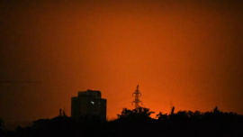 The sky over Kyiv glows during Russian missile strikes on the Ukrainian on July 19, 2026. Photo: AFP
