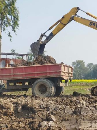 Topsoil removal brick making.jpg