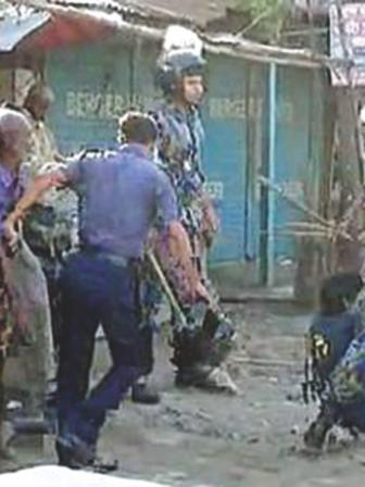 cop villagers clash 4.jpg